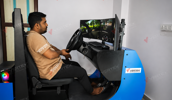 vertex-advanced-lmv-driving-simulator--at-dhwani-driving-school,-ernakulam,-kerala.-to-improve-safe-driving-techniques,-and-build-confidence-in-a-controlled-environment-before-driving-on-public-roads.