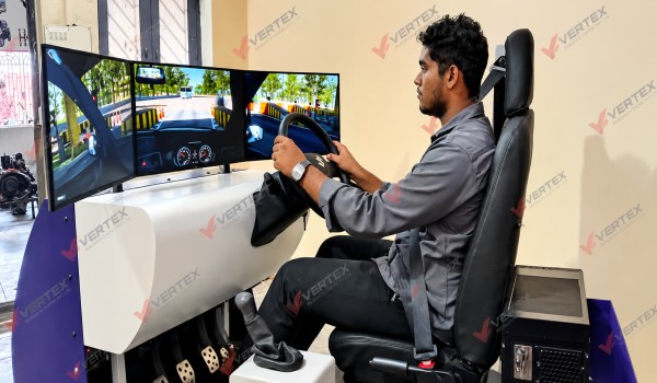 vertex-driving-simulator-at-sri-ram-motor-driving-school,-chittoor,-andhra-pradesh.-the-simulator-is-designed-to-provide-students-with-a-safe,-controlled-and-realistic-environment-to-practice-essential-driving-skills-before-moving-to-real-road-training.